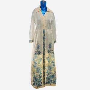 Chic Sheer Maxi Dress with Blue Floral Design